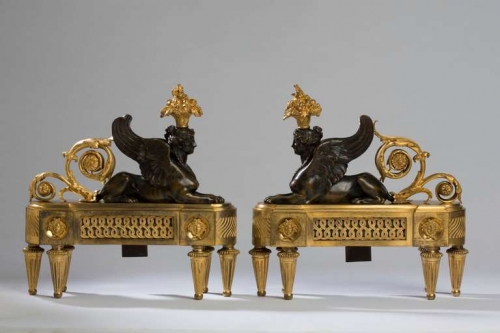 A Pair of Louis XVI Gilt and Patinated Bronze Sphinx Chenets